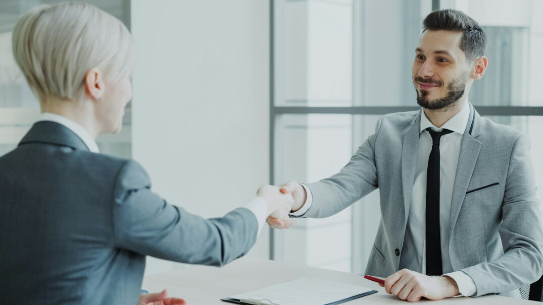 business handshake close up
